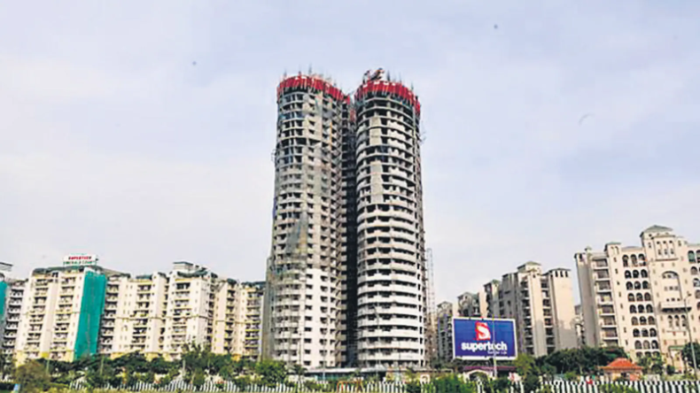 Noida Supertech Twin Towers: सुपरटेक ट्विन टावरों को ढहाने की तारीख टली, अब इस दिन गिराई जाएगी बिल्डिंग