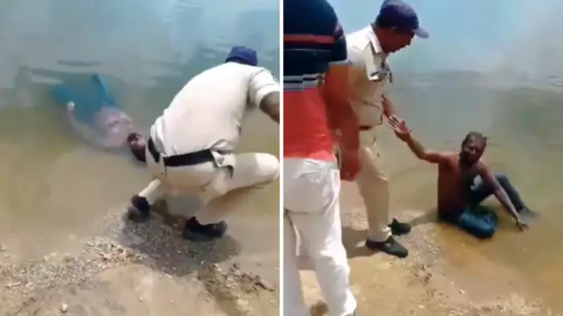 हाय गर्मी ! नदी में लेटा था व्यक्ति पुलिस ने समझा लाश….सब लोग रह गए हैरान Video Viral